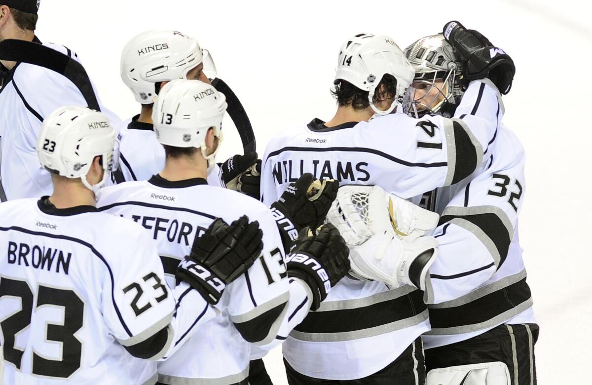 Jonathan Quick is congratulated by his teammates after a Game 7 victory over the San Jose Sharks. The Kings will now face Southern California rival the Anaheim Ducks in a series beginning Saturday at the Honda Center.