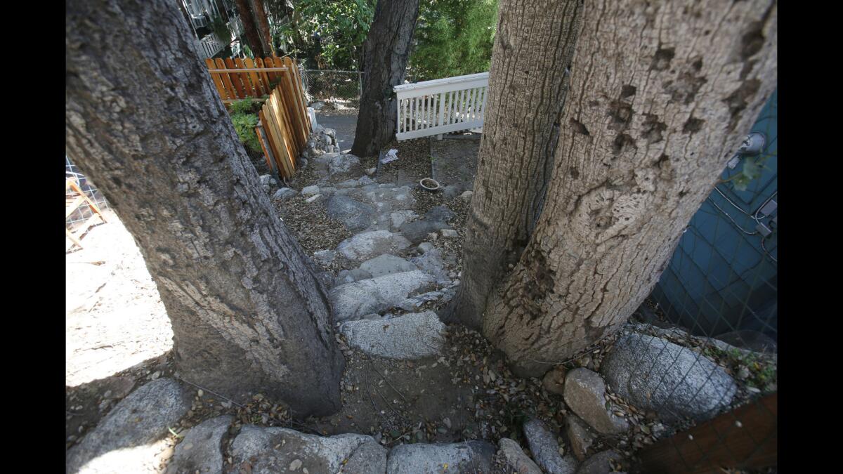 Then catch another flight of stone stairs down to flat Brookside Lane.