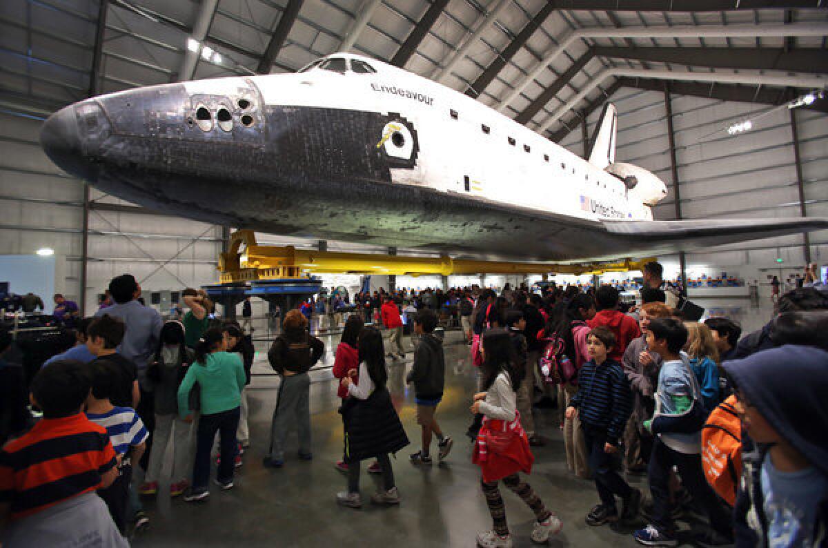 Visitors fill the Samuel Oschin Pavilion to view the space shuttle Endeavour at the California Science Center. As of March, more than 1 million people have visited the museum since the shuttle exhibit was opened.