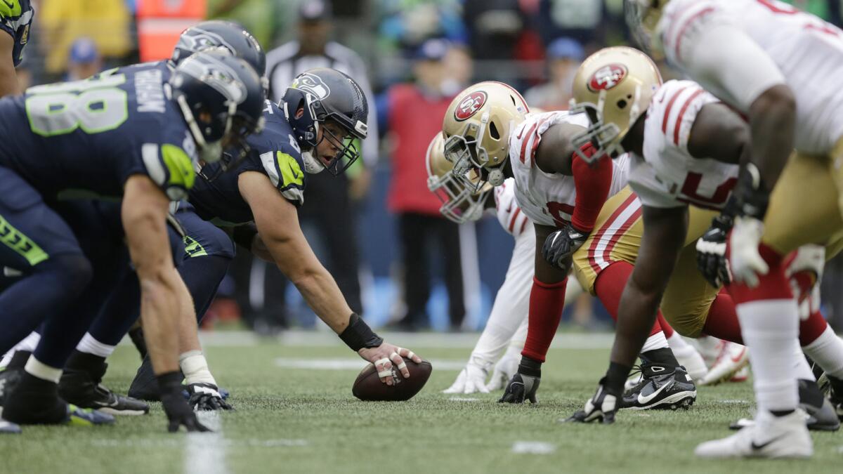 Seattle Seahawks center Justin Britt, left, lines up with teammates against the San Francisco 49ers during last Sunday's game in Seattle.