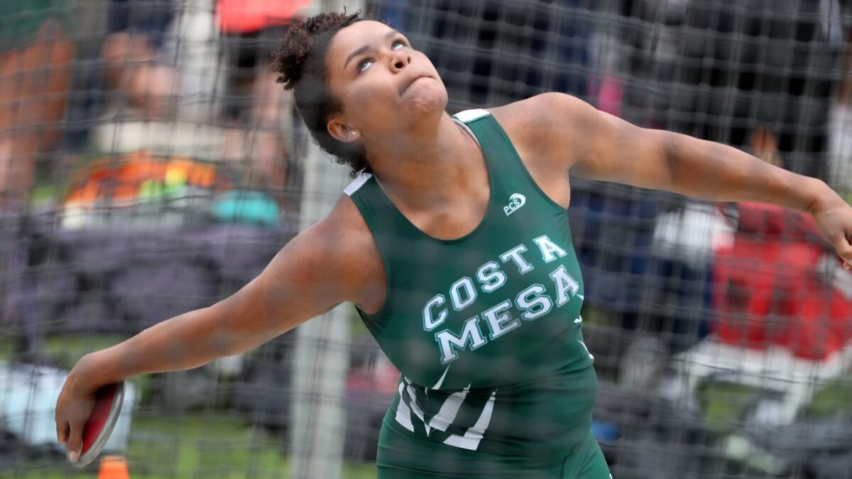 Costa Mesa High's Tayla Crenshaw throws in the CIF Southern Section Divisional finals at El Camino College in Torrance on May 19, 2018.