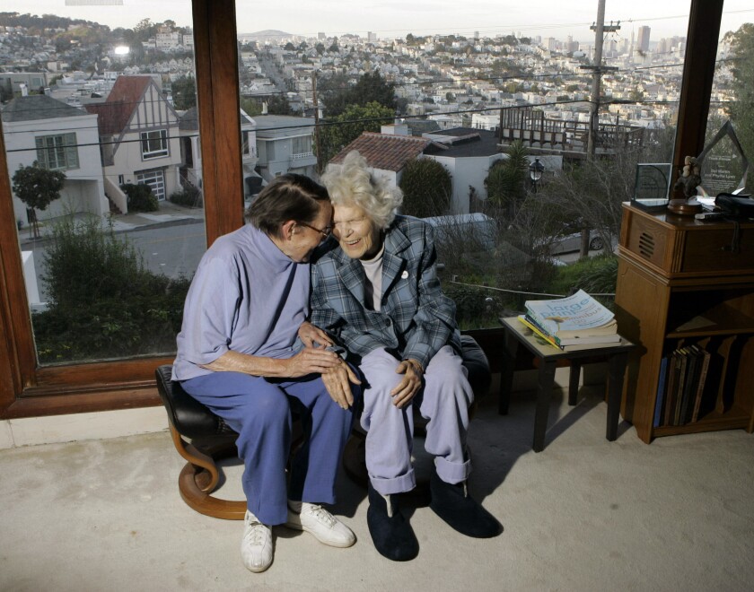 FILE - In this March 3, 2008, file photo, Phyllis Lyon, left, and Del Martin are photographed at home in San Francisco. The hilltop cottage of the couple that became the first same-sex partners to legally marry in San Francisco has become a city landmark. The San Francisco Board of Supervisors voted unanimously Tuesday, May 4, 2021, to give the 651 Duncan St. home of the lesbian activists landmark status. The home in the Noe Valley neighborhood is expected to become the first lesbian landmark in the western United States, the San Francisco Chronicle reported. (AP Photo/Marcio Jose Sanchez, file)