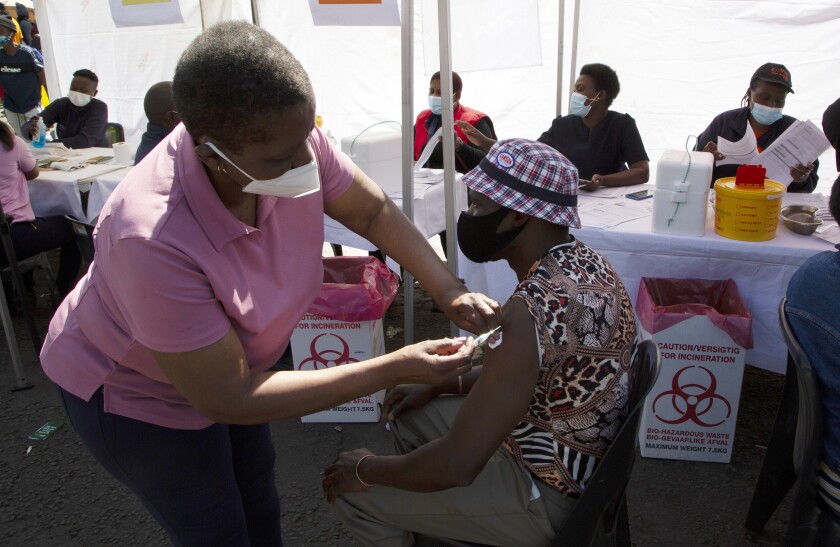 A patient receives a Johnson & Johnson vaccine at a pop-up vaccination center in Soweto, South Africa.