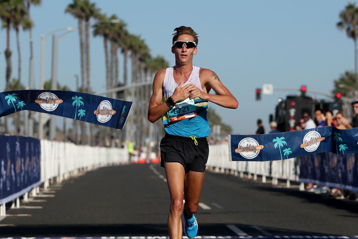 Sid Vaughn is the first man half-marathon runner to finish.