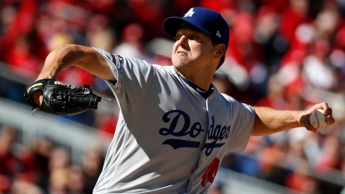 Dodgers' Rich Hill pitches against Washington on Oct. 9.