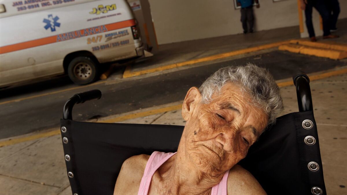 Bernadina Ortiz, 89, is released from the hospital in San Juan.