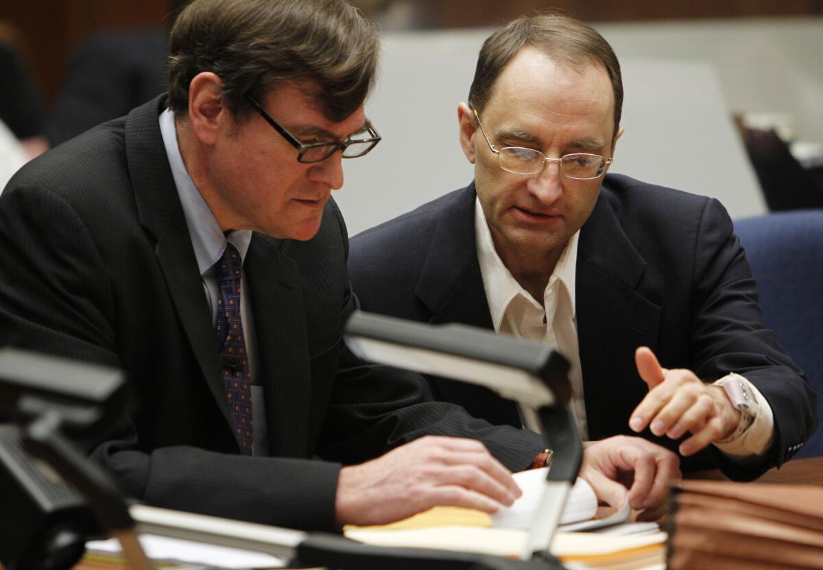 Christian K. Gerhartsreiter, right, with attorney Brad Bailey during a recent court hearing in the ongoing murder trial.