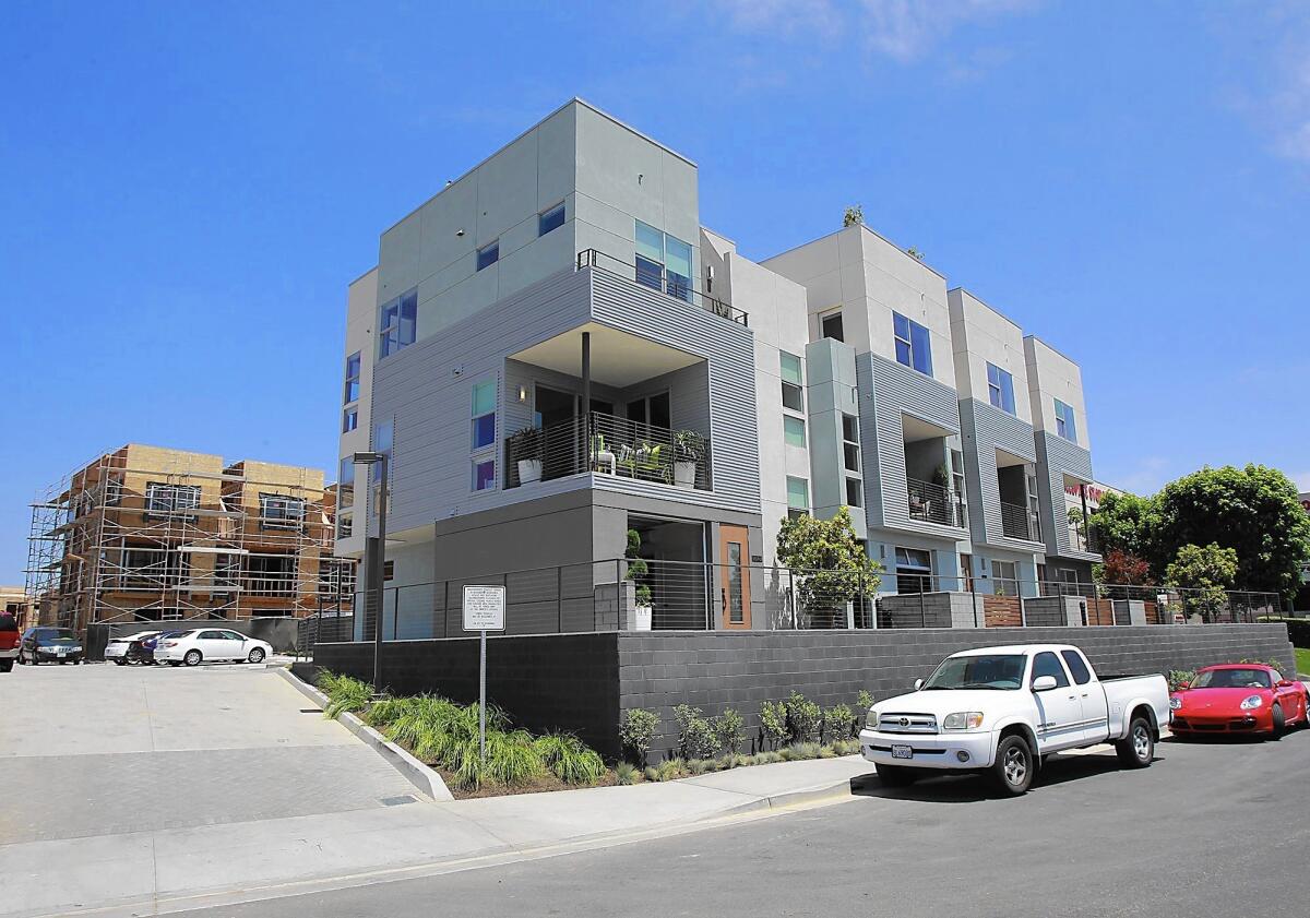 Level 1, seen here in June 2014, is one of several Westside Costa Mesa housing tracts that has three-story homes with a contemporary style. These style of homes have been the subject of recent debate in Costa Mesa.