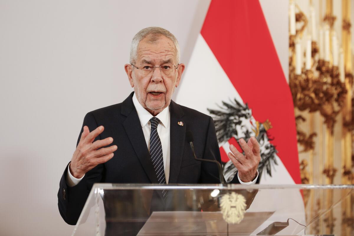 FILE - Austrian President Alexander Van der Bellen addresses the media during a joint press conference with the President of Ireland, Michael D. Higgins, in Vienna, Austria, April 6, 2022. (AP Photo/Theresa Wey, File)