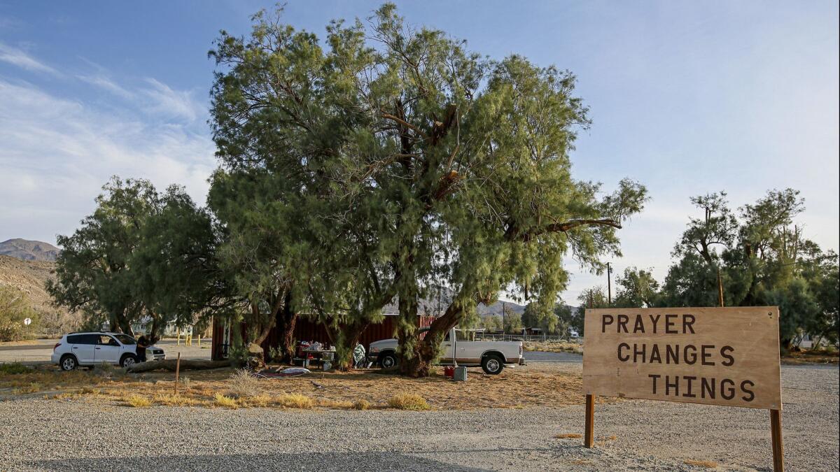 Fred Byrd, 67, and Kay Byrd, 64, have been living with two daughters and one granddaughter under a tree along Trona Road.