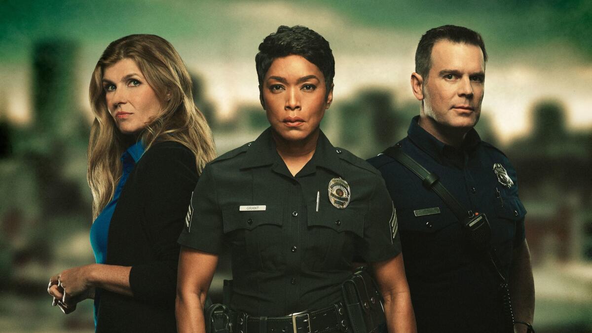 Connie Britton, left, Angela Bassett and Peter Krause in a promotional photo for "9-1-1"