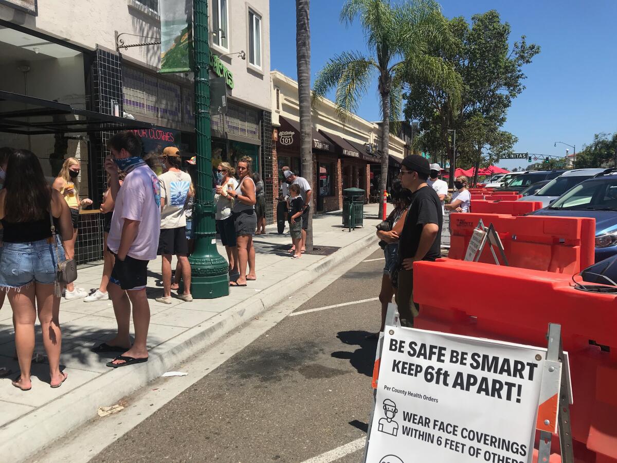 The city has allowed restaurants to extend service onto the street on the 101.