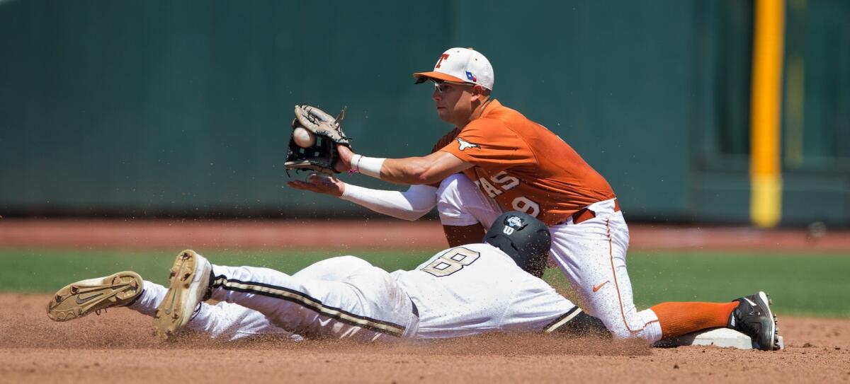 Vanderbilt's Rhett Wiseman is caught stealing at second base by Texas' C.J. Hinojosa during the second inning of the Longhorns' 4-0 over the Commodores.