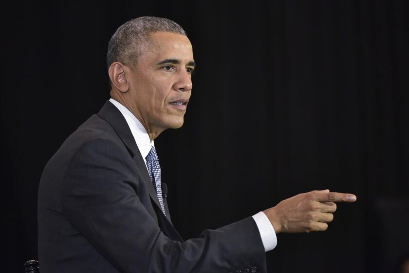 President Barack Obama takes part in a discussion on the Supreme Court and the country's judicial system at the University of Chicago Law School on Thursday.