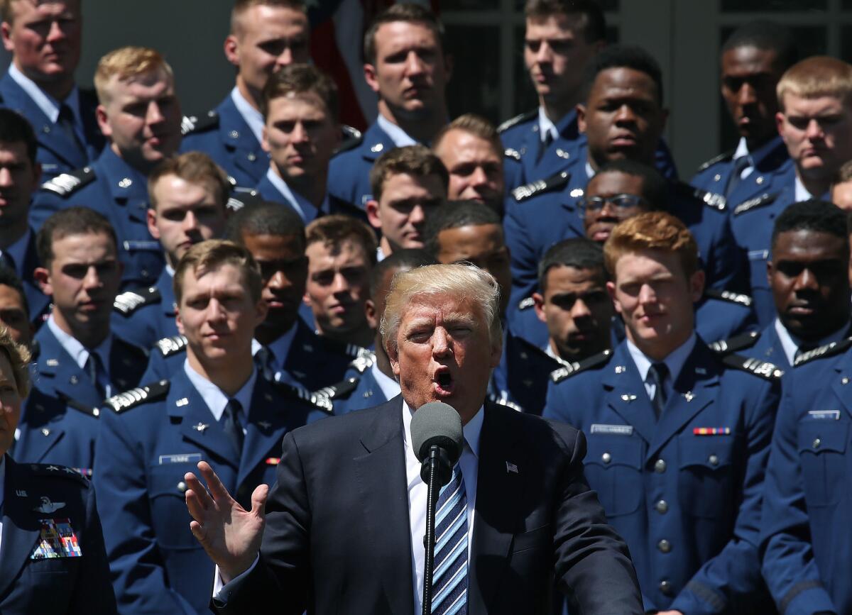 President Trump speaks at a Rose Garden ceremony to honor the U.S. Air Force Falcons football team.