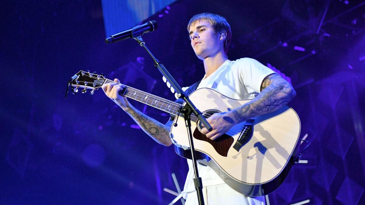 Justin Bieber performs Friday night during KIIS-FM's Jingle Ball concert at Staples Center.