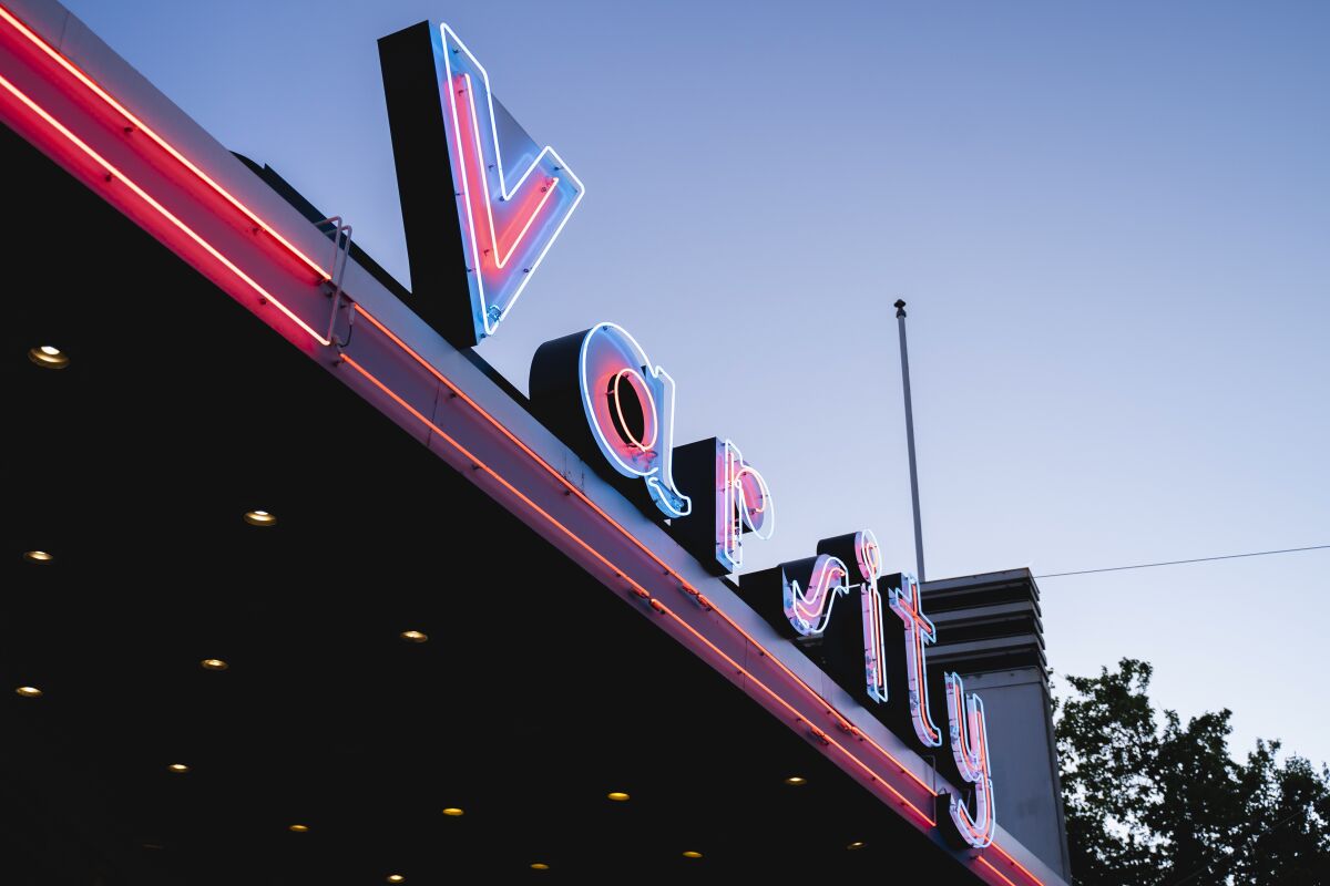 Neon letters that read "Varsity."
