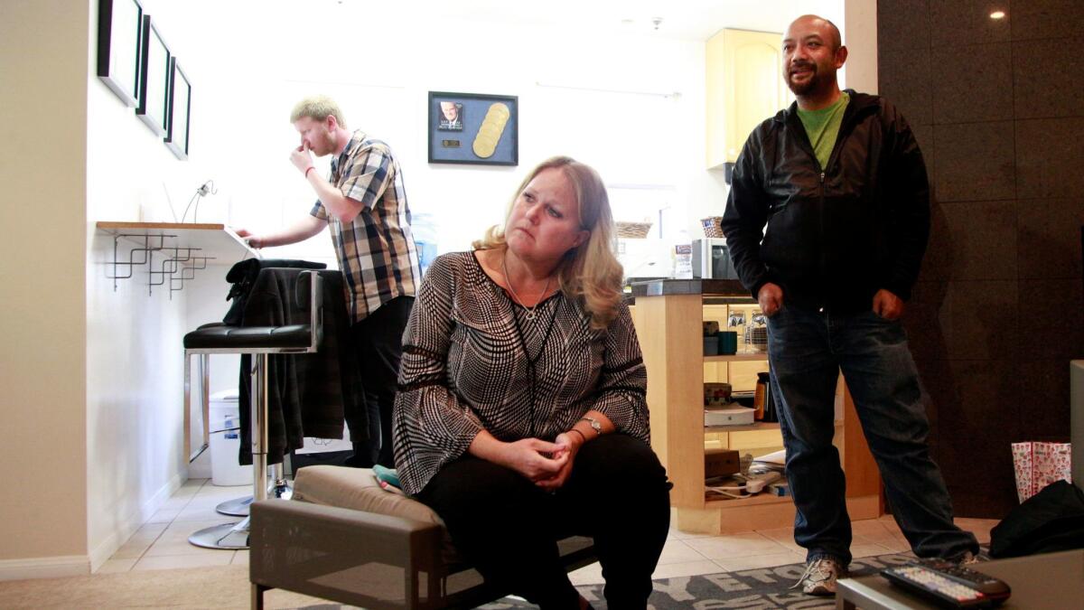 Debra Deyan listens to an audiobook recording at Deyan Studios.