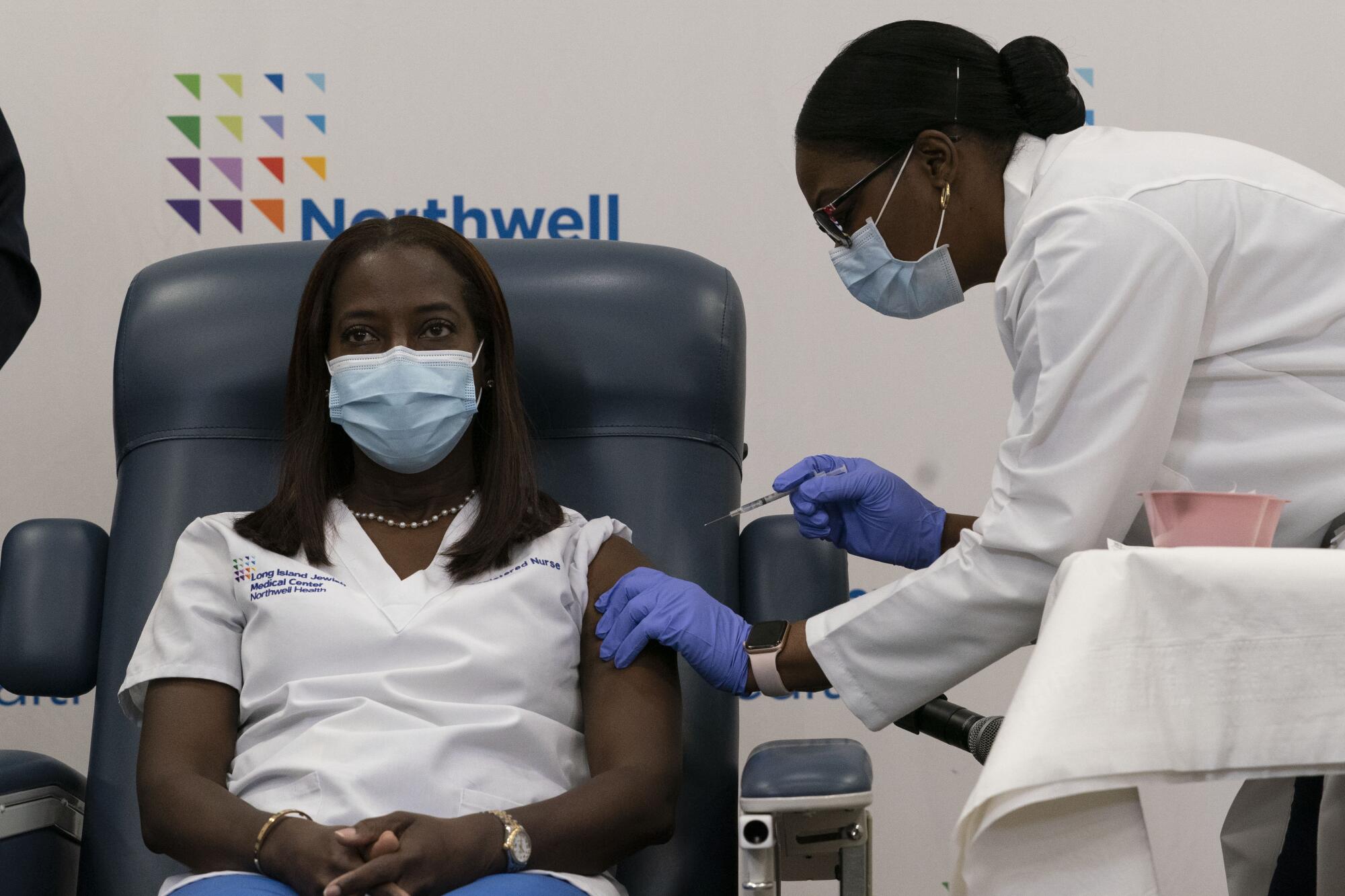 Nurse Sandra Lindsay receives a COVID-19 shot