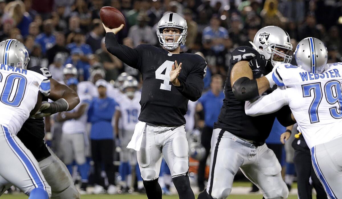 Quarterback Derek Carr, shown in an preseason game against the Detroit Lions, completed 11 of 13 passes for 143 yards in leading the Raiders to four touchdowns in four drives against the Seattle Seahawks last week.