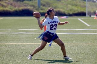 Garfield quarterback Gisselle Galicia throws pass during the Rams' Flag Football Jamboree.