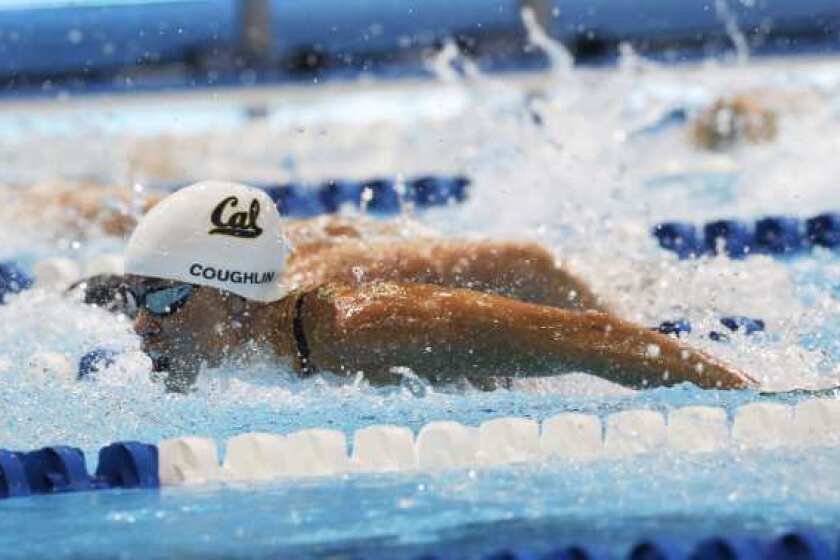 Natalie Coughlin swims in the women's 100-meter butterfly semifinals at the U.S. Olympic swimming trials on June 25.
