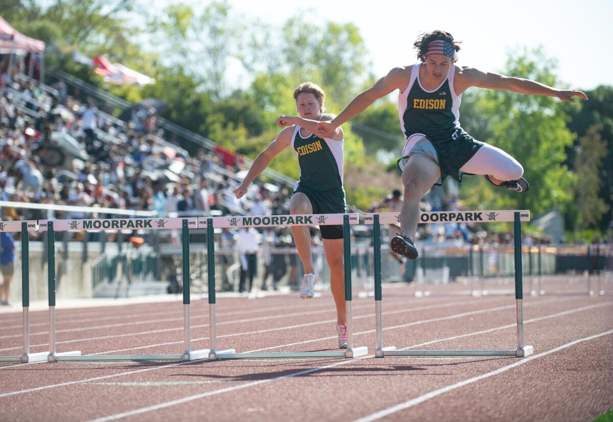 Edison's Shea Summers and Mason York compete in the 300-meter hurdles during the CIF Southern Section track and field finals.