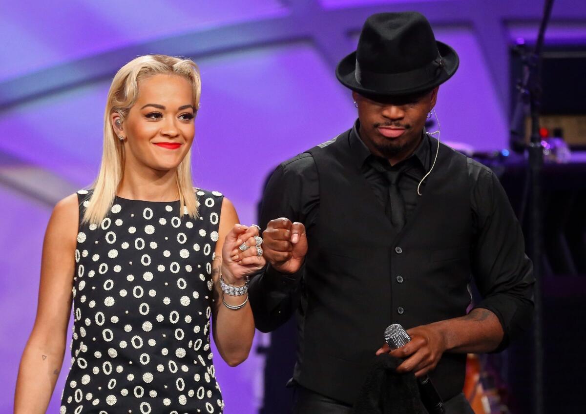 Recording artists Rita Ora and Ne-Yo perform onstage during the 22nd Annual Race To Erase MS gala.