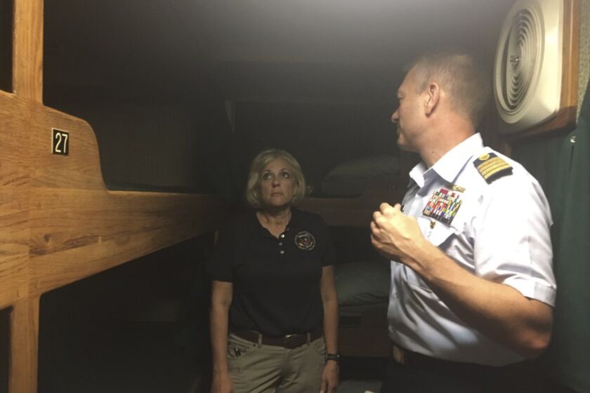 NTSB Board Member Jennifer Homendy and USCG Capt. Jason Neubauer tour the berthing area of small passenger vessel Vision, a similar vessel to Conception.