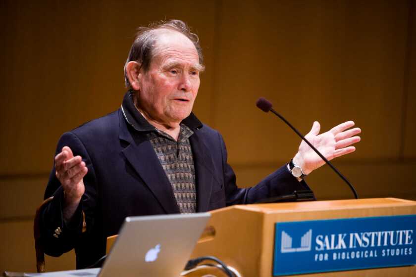 Sydney Brenner speaks at the Salk Institute in this undated photo. He joined the faculty in 1976, and was on the emeritus staff at the time of his death in 2019.