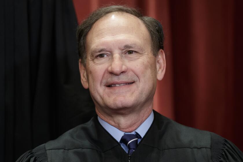 Associate Justice Samuel Alito Jr., nominated by President George W. Bush, sits with fellow Supreme Court justices for a group portrait at the Supreme Court Building in Washington, Friday, Nov. 30, 2018. (AP Photo/J. Scott Applewhite)