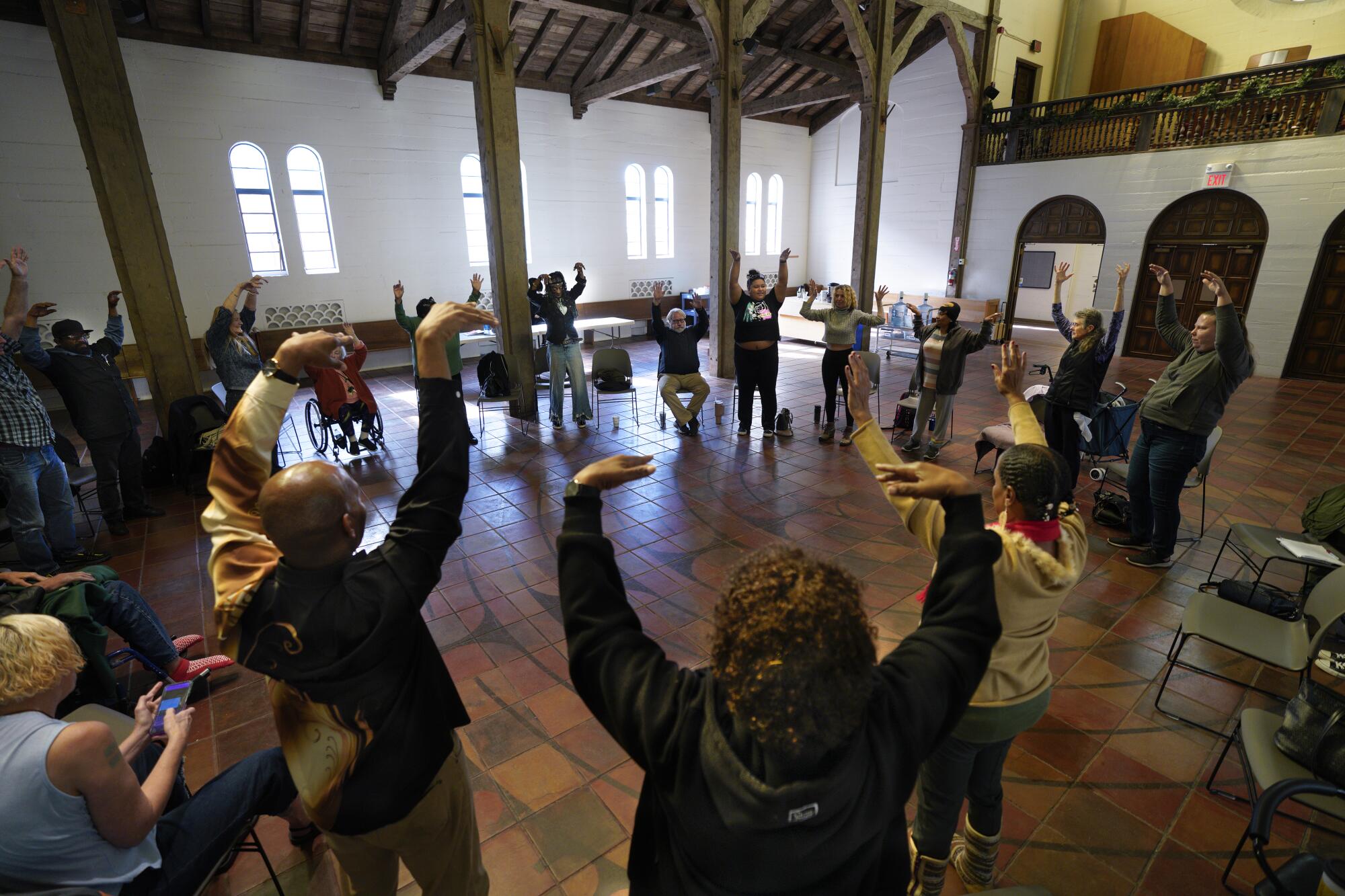 Members of the Voices Of Our City Choir prepare for a new musical at St. Paul's Cathedral on Jan. 26.