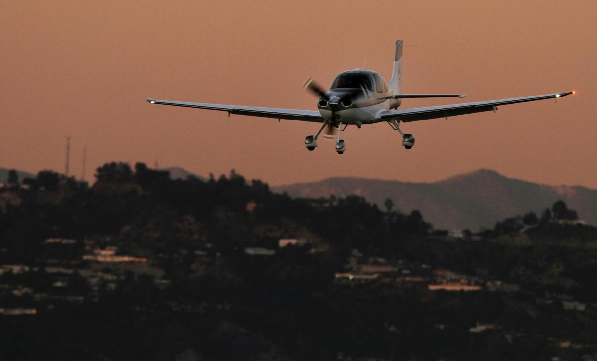 A small private plane is on final approach to Santa Monica Municipal Airport, the focus of an intense battle over whether it should be closed.