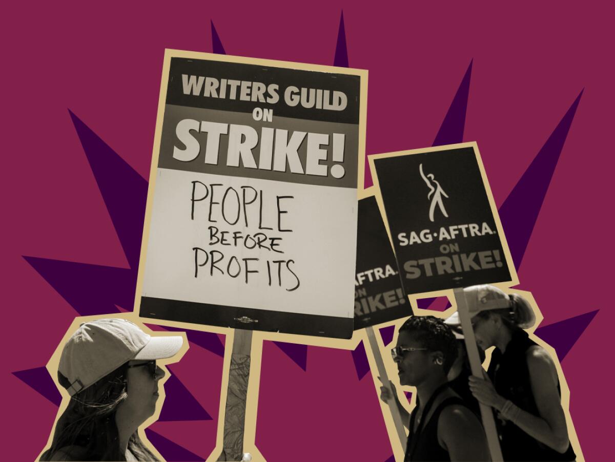 Writers Guild and SAG-AFTRA members hold picket signs.