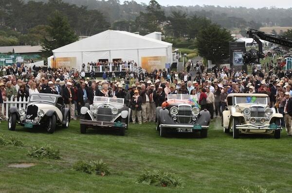 A quartet of cars line up just before the Best of Show winner at the 2012 Pebble Beach Concours d'Elegance is announced. Moments later, the 1928 Mercedes-Benz 680S Saoutchik Torpedo, second from the left, was announced as the winner.