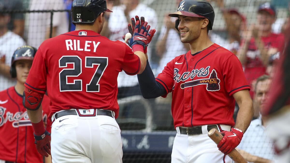 Riley's hot bat, Wright's 13th win lead Braves past D-backs - The