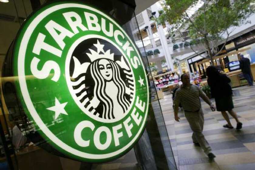 Starbucks explores several new initiatives, including energy drinks, during its annual shareholders meeting.