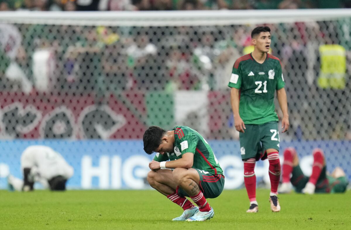 Mexico's Kevin Alvarez reacts after the World Cup group C soccer match against Saudi Arabia.