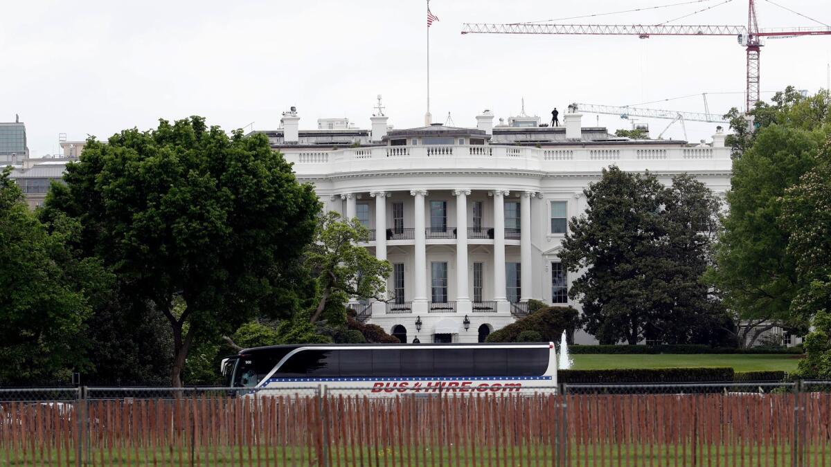 A bus carrying U.S. senators at the White House on Wednesday.