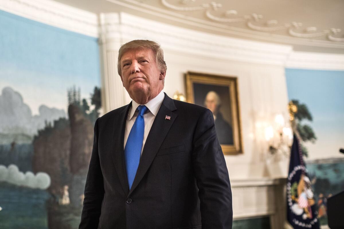 President Trump departs a White House news conference on Oct. 13, 2017, announcing that he is pulling the U.S. out of the Iran nuclear deal.