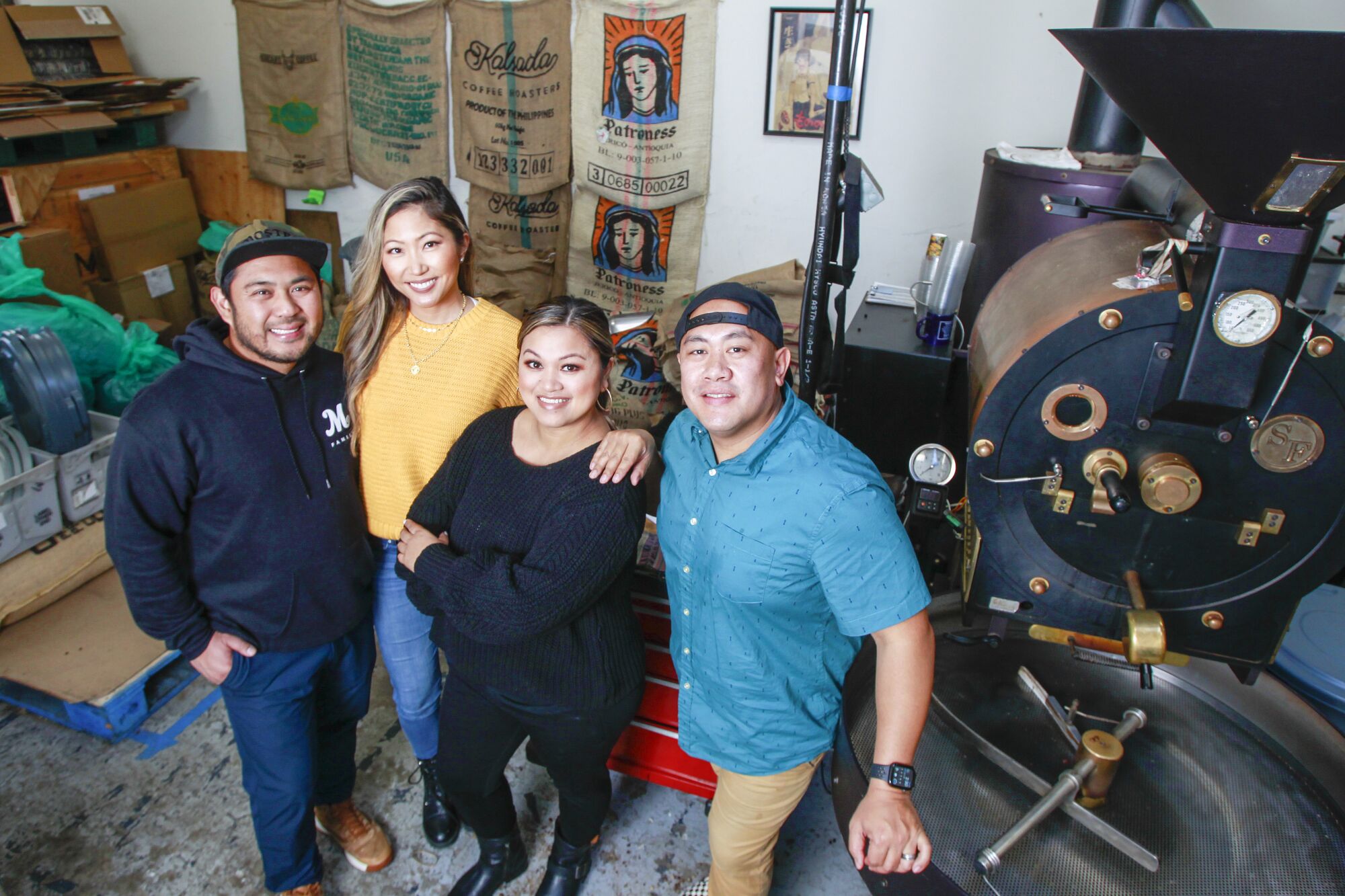 Mostra founders (from left) Sam Magtanong, Jelynn Malone, Beverly Magtanong and Mike Arquines in the company's Carmel Mountain Ranch roasting facility.