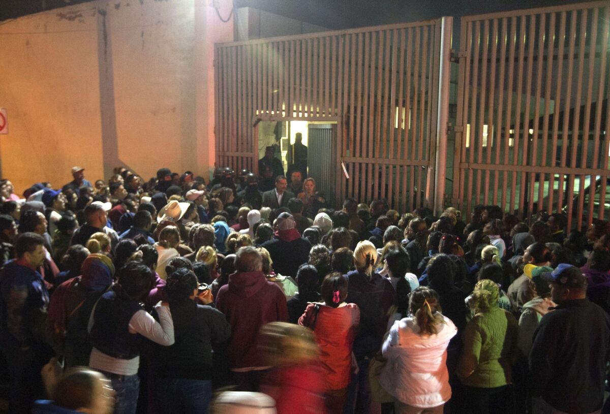 Relatives of inmates gather outside the Topo Chico prison in the northern city of Monterrey in Mexico on Feb. 11.