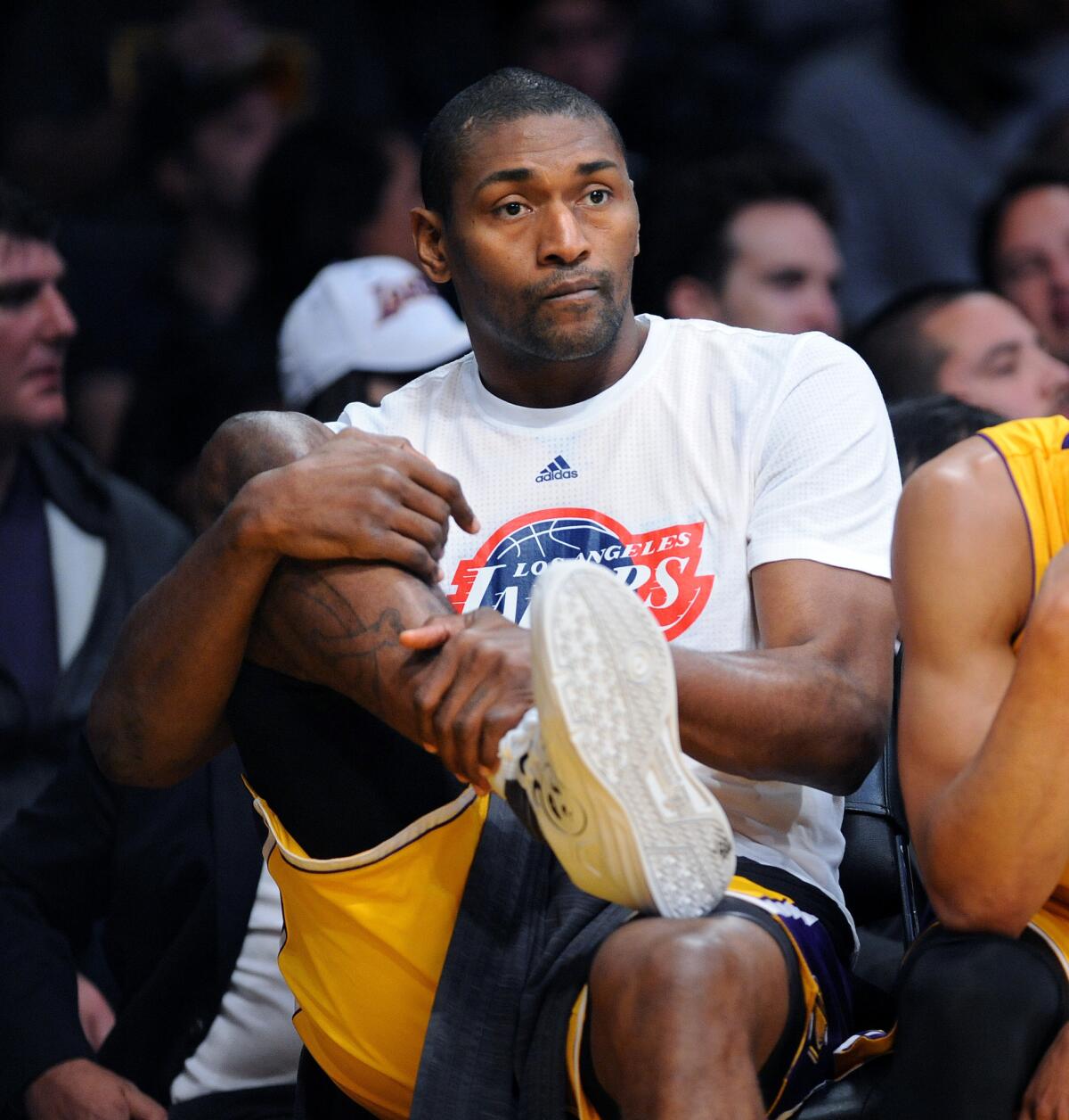 Los Angeles Lakers small forward Metta World Peace, right, works