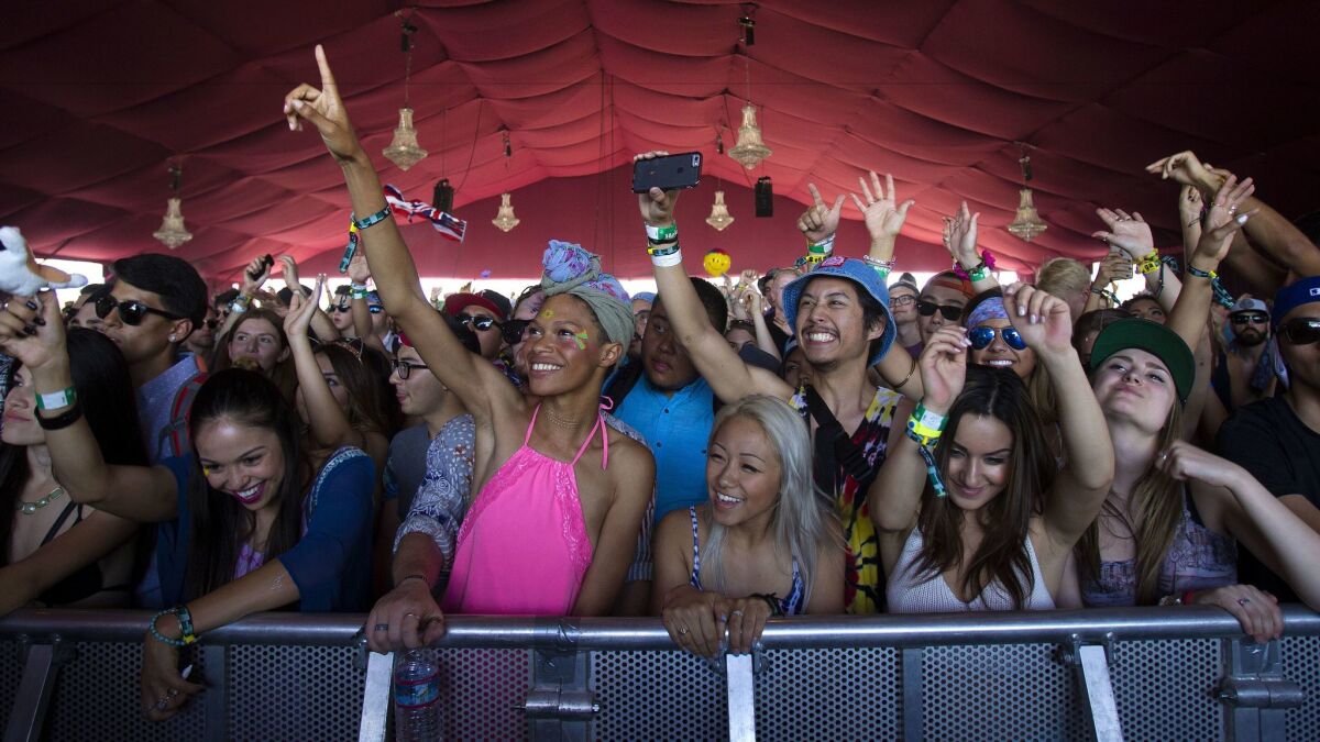 Fans of Cashmere Cat enjoy themselves at the 2015 edition of the Coachella Valley Music & Arts Festival.