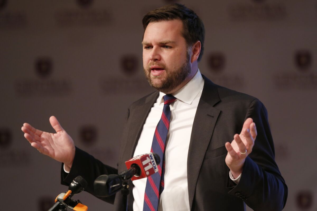 J.D. Vance, a Republican running for an open U.S. Senate seat in Ohio, speaks to reporters following a debate with other Republicans at Central State University in Wilberforce, Ohio, Monday, March 28, 2022. (AP Photo/Paul Vernon)