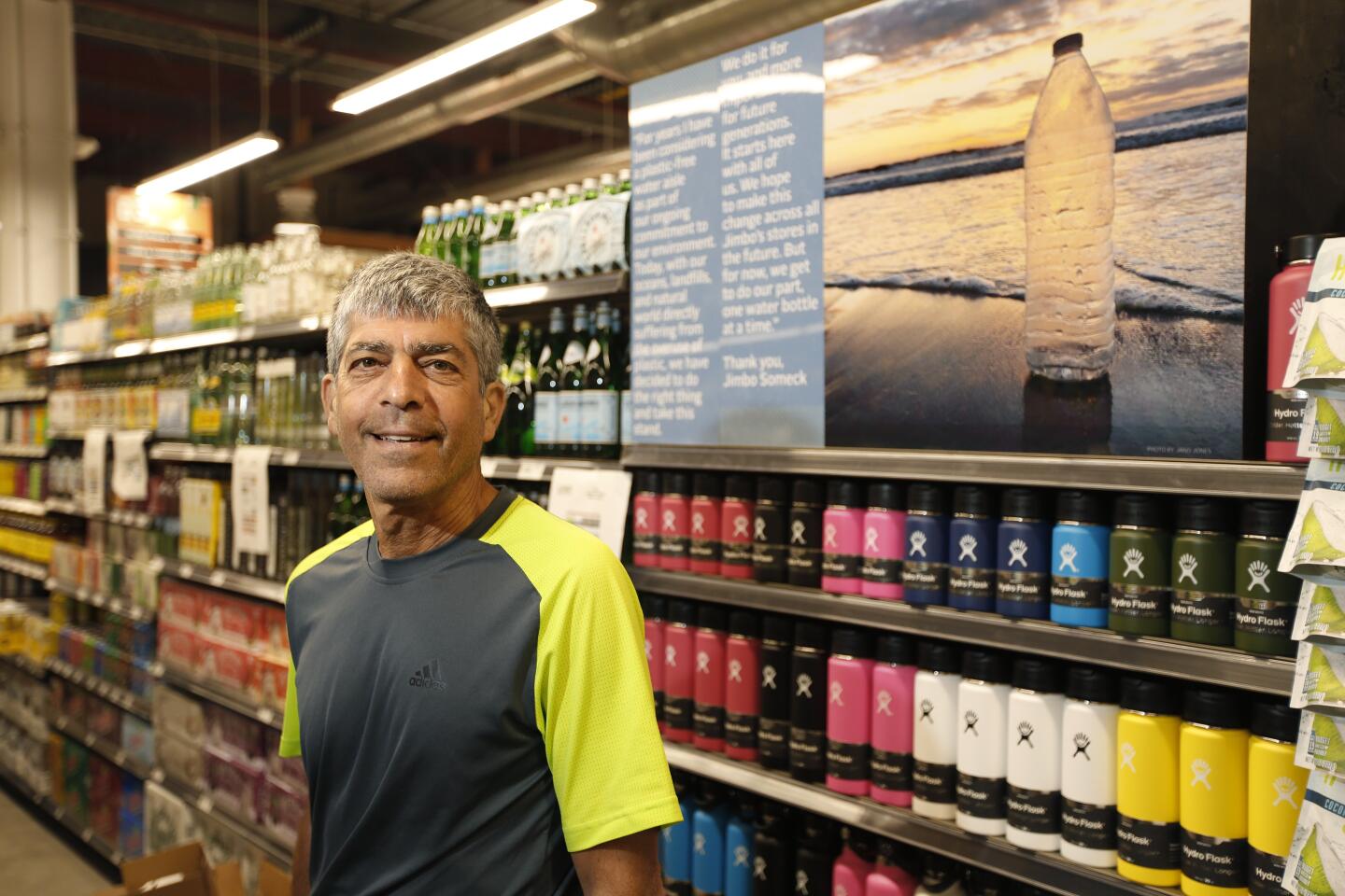 Jimbo Someck, founder and president, Jimbo’s Naturally stands in his new Carmel Valley location, which doesn't sell any water in plastic bottles on Sept. 17, 2019.