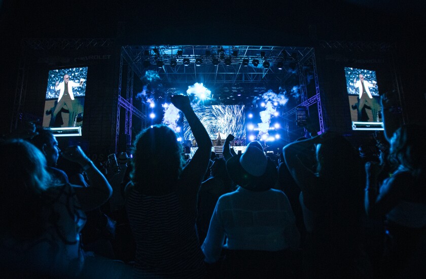 Fans cheer as Pitbull performs at the L.A. County Fair on Sept. 12, 2019.