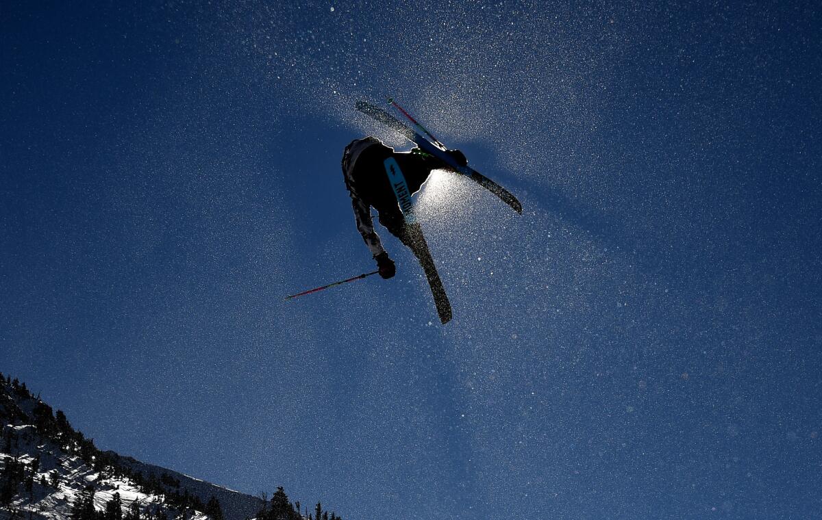 MAMMOTH, CALIFORNIA JANUARY 1, 2018-A competitor launches off a ramp during the Men's Slopestyle Qualifier in Mammoth Mountain Saturday. (Wally Skalij/Los Angeles Times)