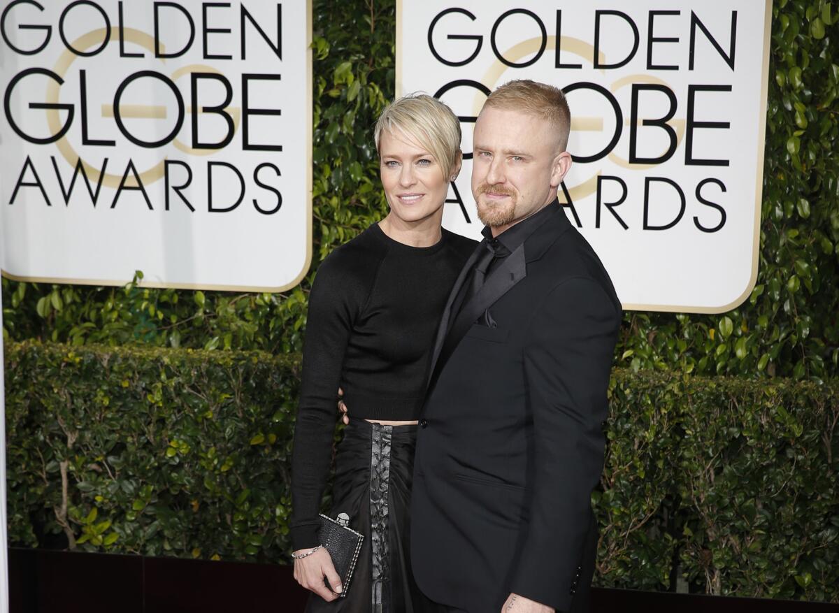 Robin Wright and Ben Foster arrive for the 72nd Golden Globe Awards show at the Beverly Hilton Hotel on Jan. 11, 2015.