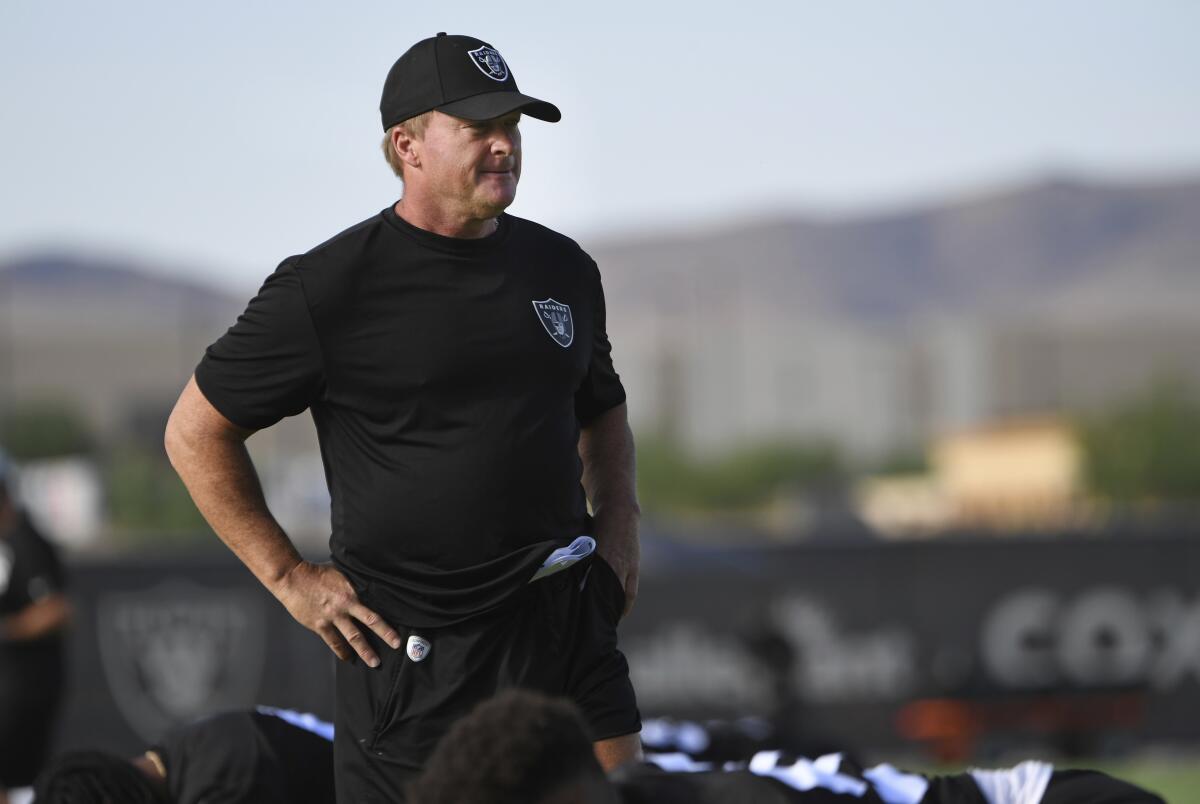 Las Vegas Raiders head coach Jon Gruden looks on during an NFL football practice Wednesday, July 28, 2021, in Henderson. (AP Photo/David Becker)